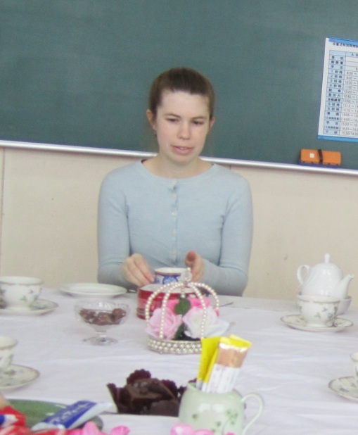 I am not allowed to post pictures containing my students online, but here is a cropped photograph of this poor teacher explaining things over the 
